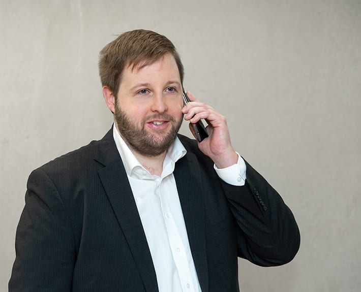 Fotografie Telefonat Kluge Versicherung